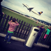 Watching planes before boarding one.