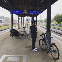 Last leg of our #roadtrip. Waiting for the train to take us home in the rain.