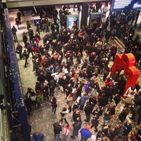 People waiting for their trains. the whole station is fu of them